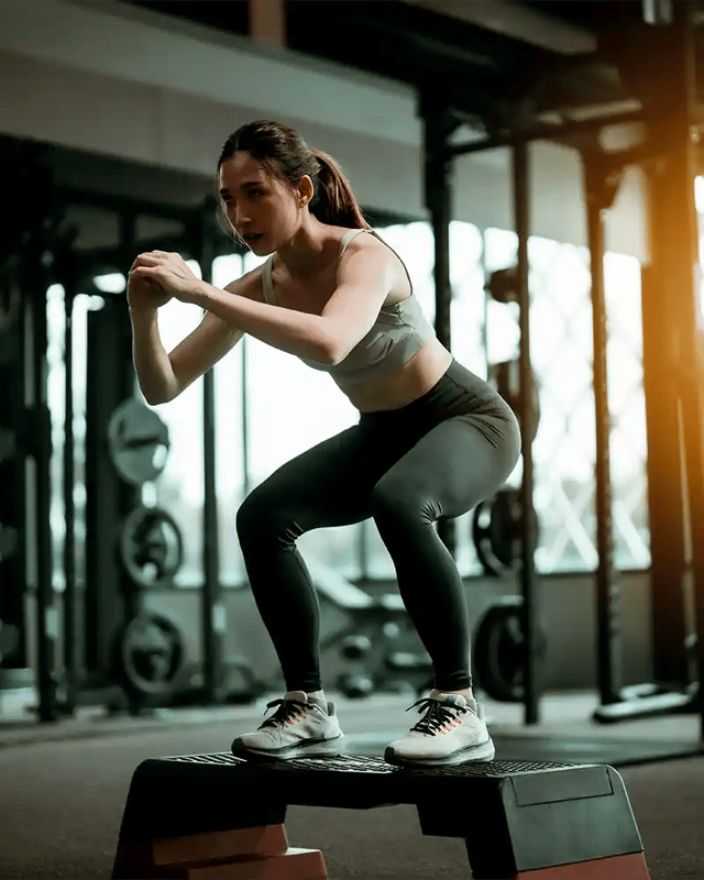 Woman exercising in a gym