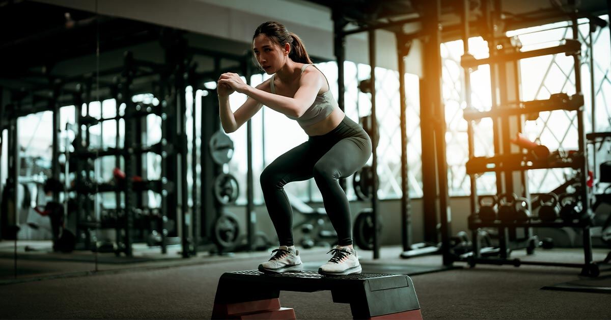 Woman at a fitness center training