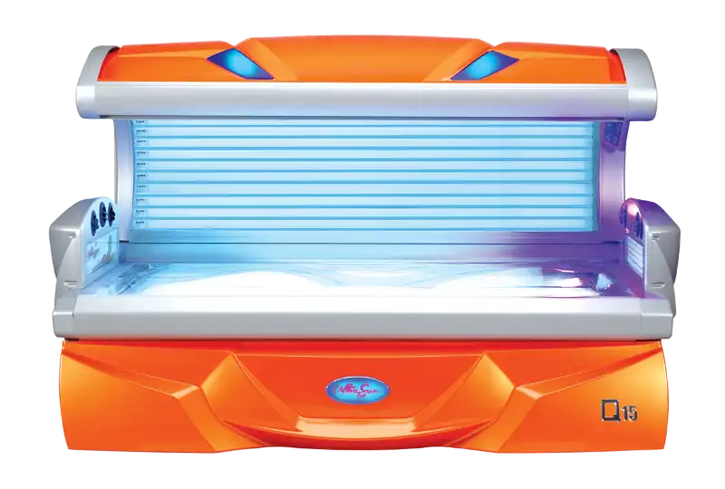 An open, bright orange and silver lie-down Ultrasun Q15 tanning bed with illuminated blue UV lamps and an acrylic base.